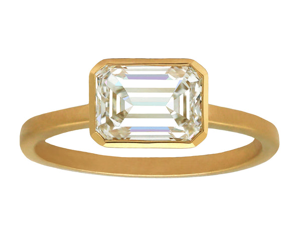 Emerald Cut Diamond Set East-West in Gold Bezel Ring